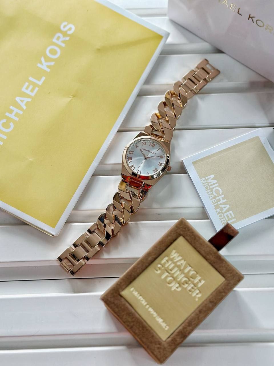 Michael Kors modern and stylish watch would be a great accessory for you