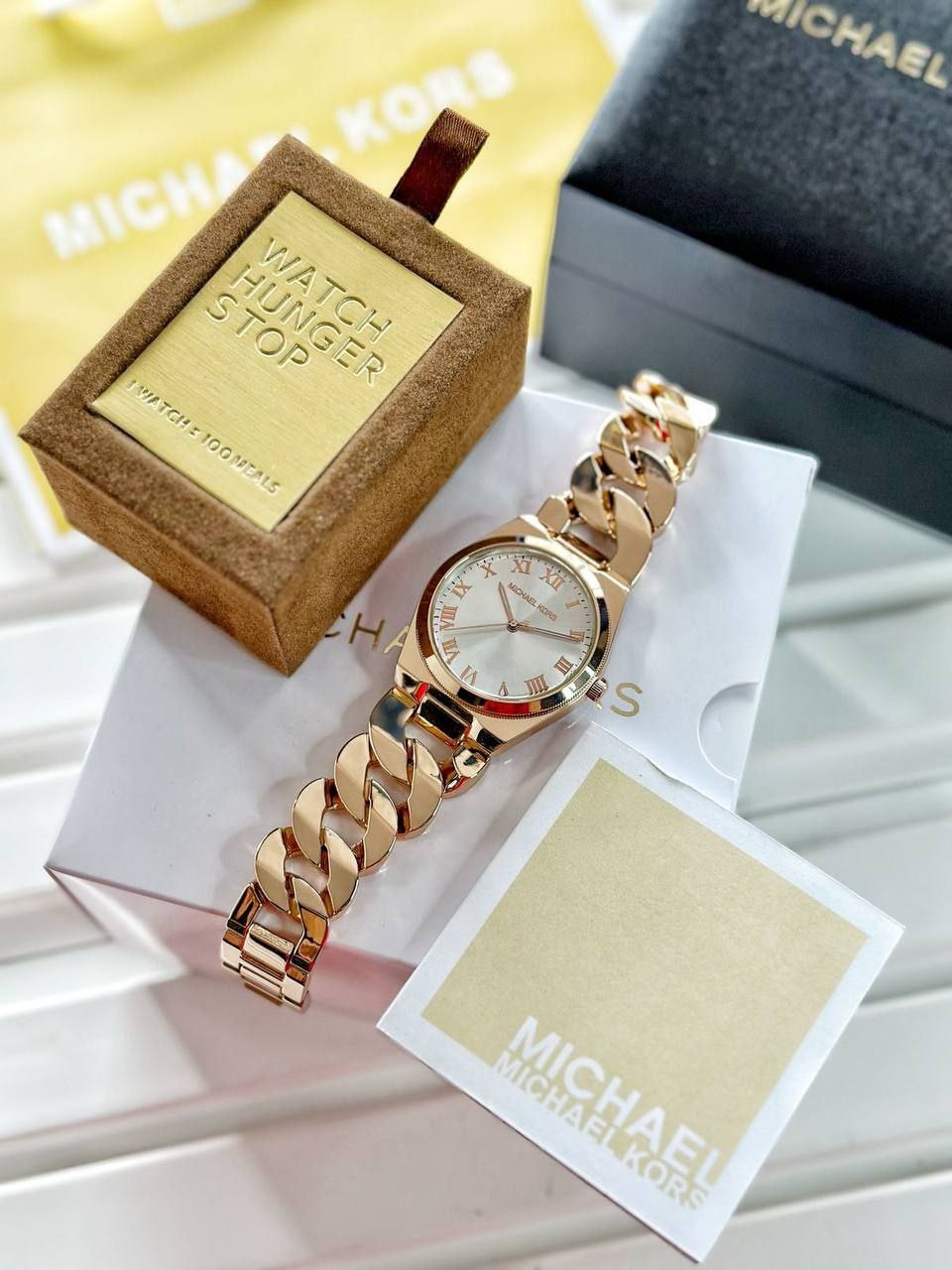 Michael Kors modern and stylish watch would be a great accessory for you