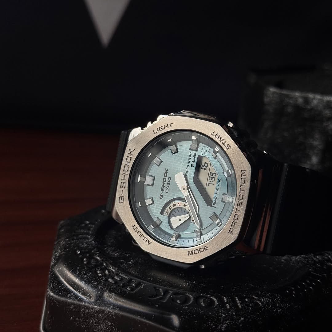 G-Shock GBM2100A with silver metal body and blue dial