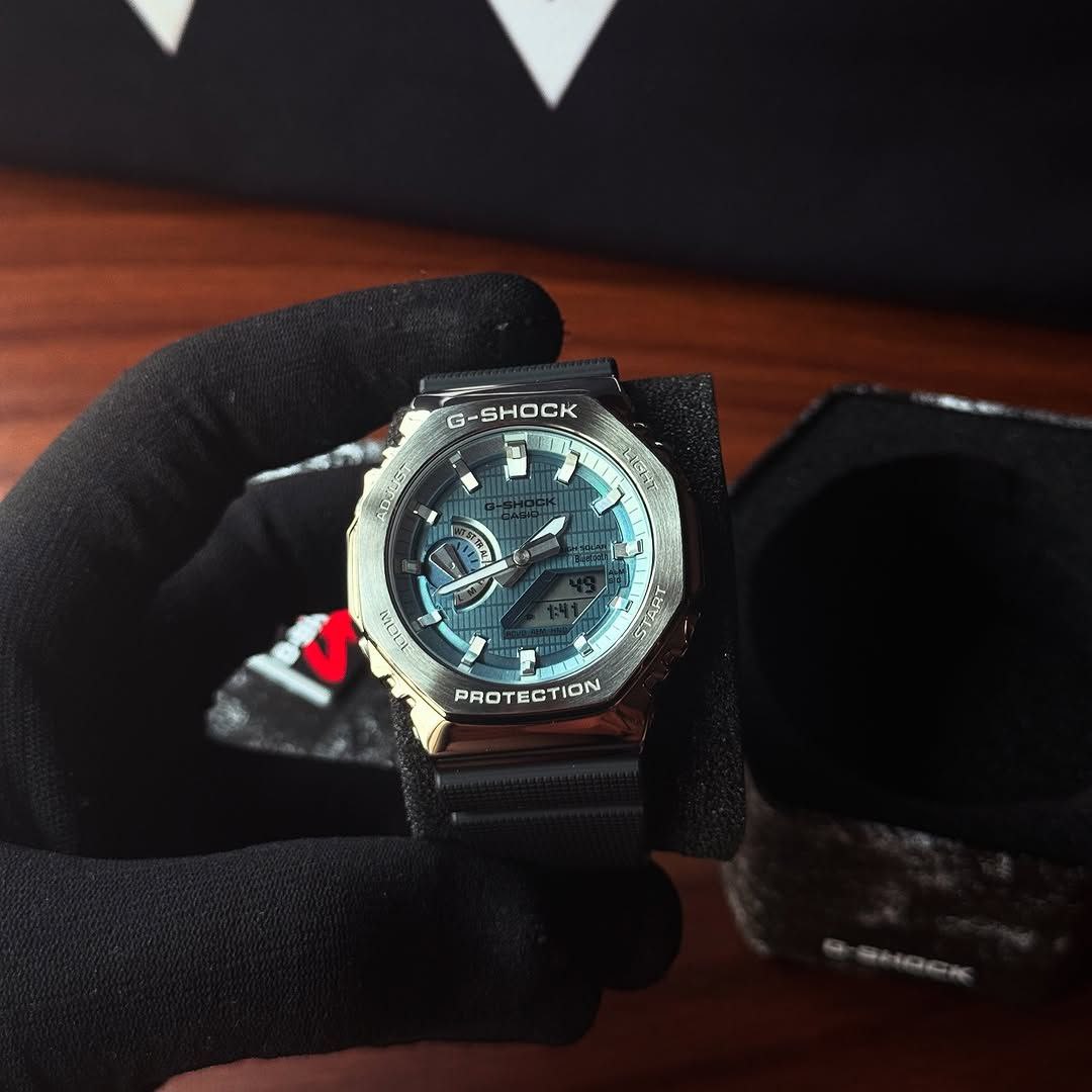 G-Shock GBM2100A with silver metal body and blue dial