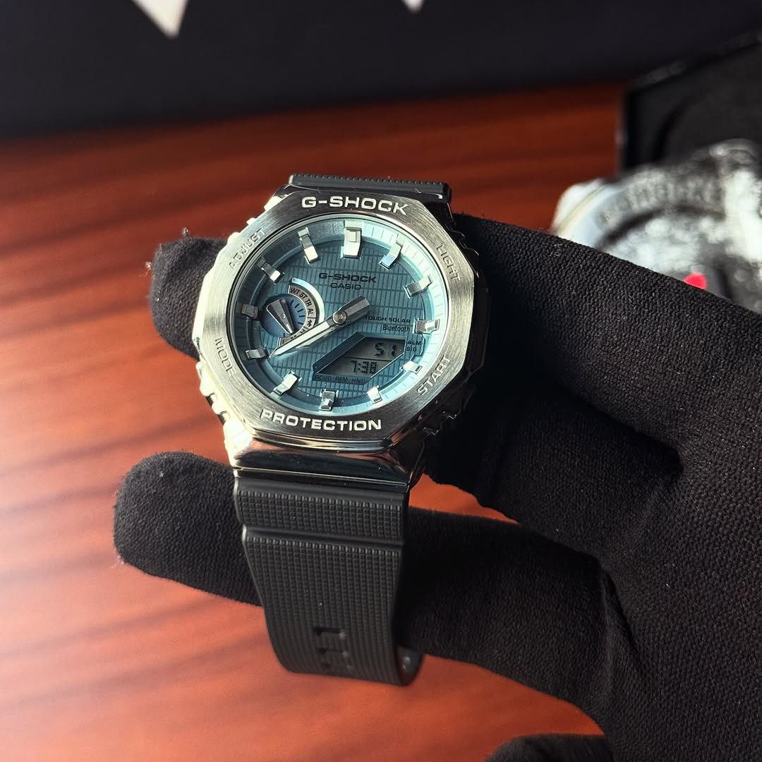 G-Shock GBM2100A with silver metal body and blue dial
