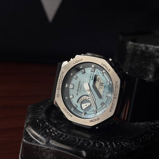 G-Shock GBM2100A with silver metal body and blue dial