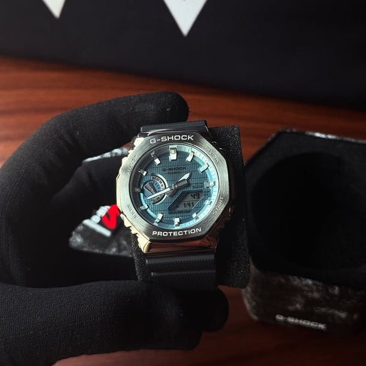 G-Shock GBM2100A with silver metal body and blue dial